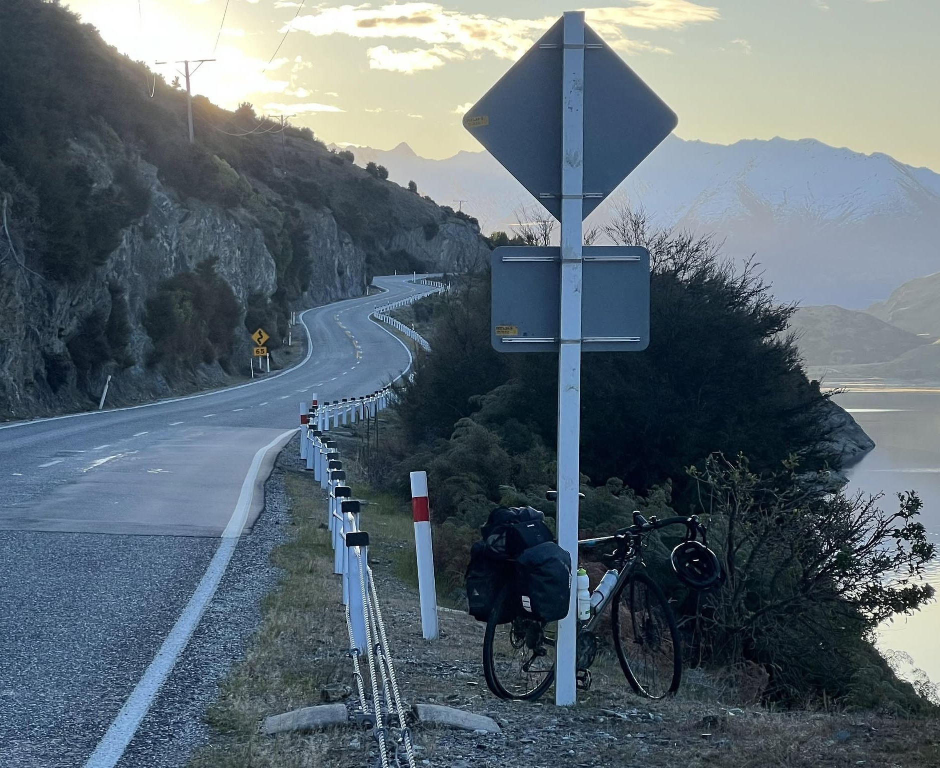 The bike parked by the road